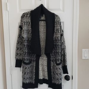 Long knitted sweater